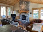 Hemlock log home with fireplace, mountain views and ski in/out access.